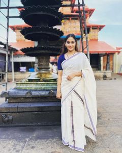 aditi-ravi-new-photos-in-golden-saree-latest-005