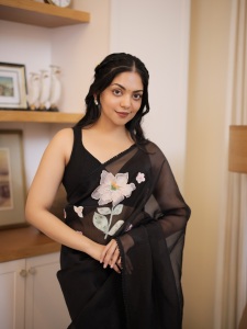 ahaana-krishna-in-glass-tissue-saree-in-a-black-shade-photos-006