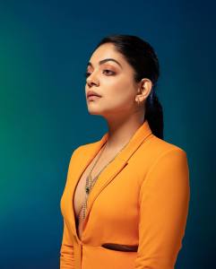ahaana-krishna-in-orange-suit-photos-004