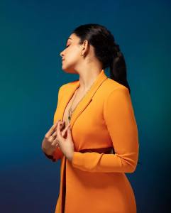 ahaana-krishna-in-orange-suit-photos-007