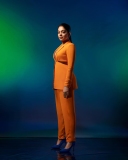 ahaana-krishna-in-orange-suit-photos-003