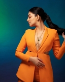 ahaana-krishna-in-orange-suit-photos