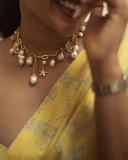 aishwarya-lekshmi-in-yellow-beautiful-saree-and-ornaments-photos-003