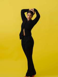 aishwarya-rajesh-in-Modern-Black-Pant-Suit-Ensemble-paired-with-bright-orange-pointed-heels-for-contrast-004