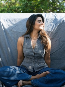 aishwarya-rajesh-in-Tailored-sleeveless-vest-top-paired-casually-with-wide-leg-blue-denim-jeans-001