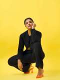 aishwarya-rajesh-in-Modern-Black-Pant-Suit-Ensemble-paired-with-bright-orange-pointed-heels-for-contrast-003