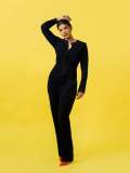 aishwarya-rajesh-in-Modern-Black-Pant-Suit-Ensemble-paired-with-bright-orange-pointed-heels-for-contrast