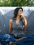 aishwarya-rajesh-in-Tailored-sleeveless-vest-top-paired-casually-with-wide-leg-blue-denim-jeans-001