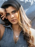 aishwarya-rajesh-in-Tailored-sleeveless-vest-top-paired-casually-with-wide-leg-blue-denim-jeans-003
