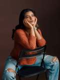 aishwarya-rajesh-in-rust-orange-terracotta-long-sleeved-sweater-with-relaxed-fit-blue-jeans-with-heavy-knee-distressing-pics-002