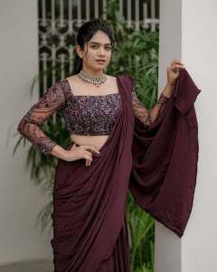 anarkali-marikar-in-modern-pre-draped-saree-in-a-deep-wine-or-plum-hue-made-of-fluid-glossy-fabric-002