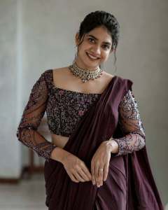 anarkali-marikar-in-modern-pre-draped-saree-in-a-deep-wine-or-plum-hue-made-of-fluid-glossy-fabric-008
