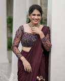 anarkali-marikar-in-modern-pre-draped-saree-in-a-deep-wine-or-plum-hue-made-of-fluid-glossy-fabric-001