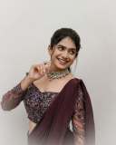 anarkali-marikar-in-modern-pre-draped-saree-in-a-deep-wine-or-plum-hue-made-of-fluid-glossy-fabric-004