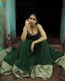 anarkali-marikar-in-structured-olive-green-corset-top-with-thin-straps-and-cupped-satin-detailing-at-the-bust-paired-with-dark-green-flared-skirt-003