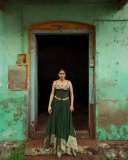 anarkali-marikar-in-structured-olive-green-corset-top-with-thin-straps-and-cupped-satin-detailing-at-the-bust-paired-with-dark-green-flared-skirt-004