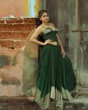 anarkali-marikar-in-structured-olive-green-corset-top-with-thin-straps-and-cupped-satin-detailing-at-the-bust-paired-with-dark-green-flared-skirt-005