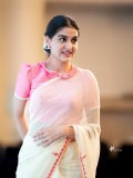 anaswara-rajan-in-rani-pink-blouse-with-off-white-saree-style-ideas-photos-005