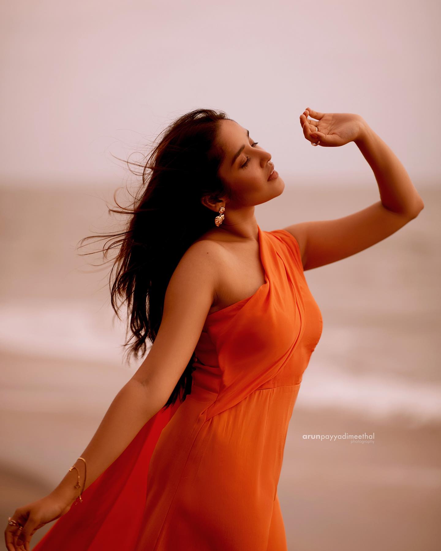 anikha-surendran-in-orange-gown-dress-photoshoot-latest-005