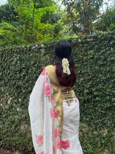 anikha-surendran-in-onam-set-saree-flower-design-photos-003