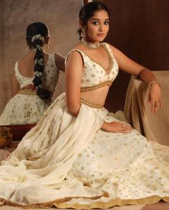 anikha-surendran-in-white-lehenga-photos-002
