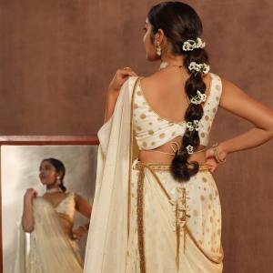 anikha-surendran-in-white-lehenga-photos-003