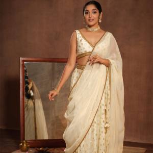 anikha-surendran-in-white-lehenga-photos-005