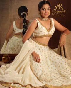 anikha-surendran-in-white-lehenga-photos-006