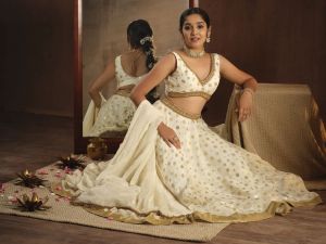 anikha-surendran-in-white-lehenga-photos-008