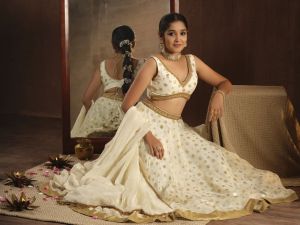 anikha-surendran-in-white-lehenga-photos-009