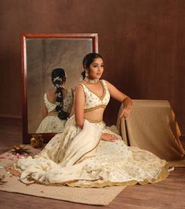 anikha-surendran-in-white-lehenga-photos-012