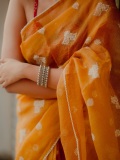 anikha-surendran-in-orange-cotton-saree-with-red-blouse-combo-style-ideas-photos-003
