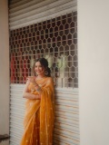 anikha-surendran-in-orange-cotton-saree-with-red-blouse-combo-style-ideas-photos