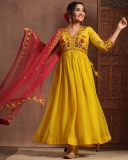 anikha-surendran-in-yellow-churidar-with-red-shawl-photos-001