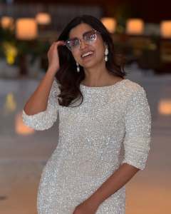 anju-kurian-in-bodycon-white-dress-photos-003