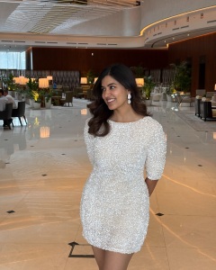 anju-kurian-in-bodycon-white-dress-photos-005