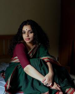 ann-augustine-in-green-saree-look-photos