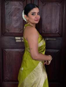 anna-ben-in-green-saree-with-hair-style-ideas-photos-001