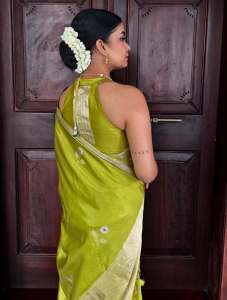 anna-ben-in-green-saree-with-hair-style-ideas-photos-002