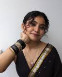 anna-ben-in-black-pattu-saree-with-sleeveless-blouse-001