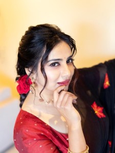 anna-rajan-in-sheer-dark-navy-blue-saree-with-contrasting-bright-crimson-red-short-sleeved-blouse-photos-004