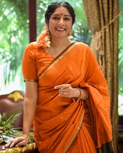 actress-anumol-in-orange-saree-with-black-mundhanai-style-photos-003