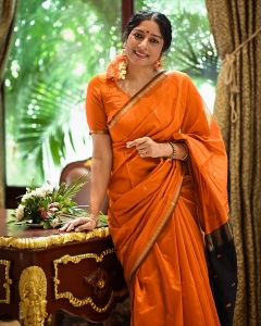 actress-anumol-in-orange-saree-with-black-mundhanai-style-photos-004