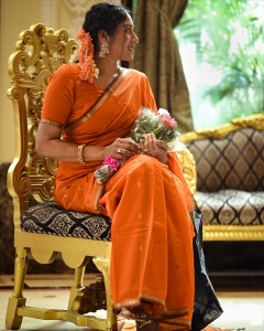 actress-anumol-in-orange-saree-with-black-mundhanai-style-photos-005