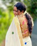 actress-anumol-onam-saree-2023-photos-003