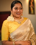 anumol-in-golden-saree-with-yellow-blouse-photos-002