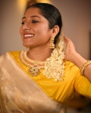 anumol-in-golden-saree-with-yellow-blouse-photos-007