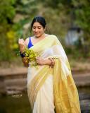 anumol-in-kerala-saree-with-blue-blouse-combination-images-001