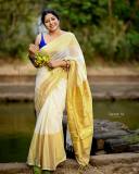 anumol-in-kerala-saree-with-blue-blouse-combination-images