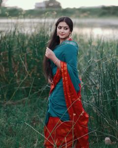 anu-sithara-in-red-and-blue-saree-latest-images